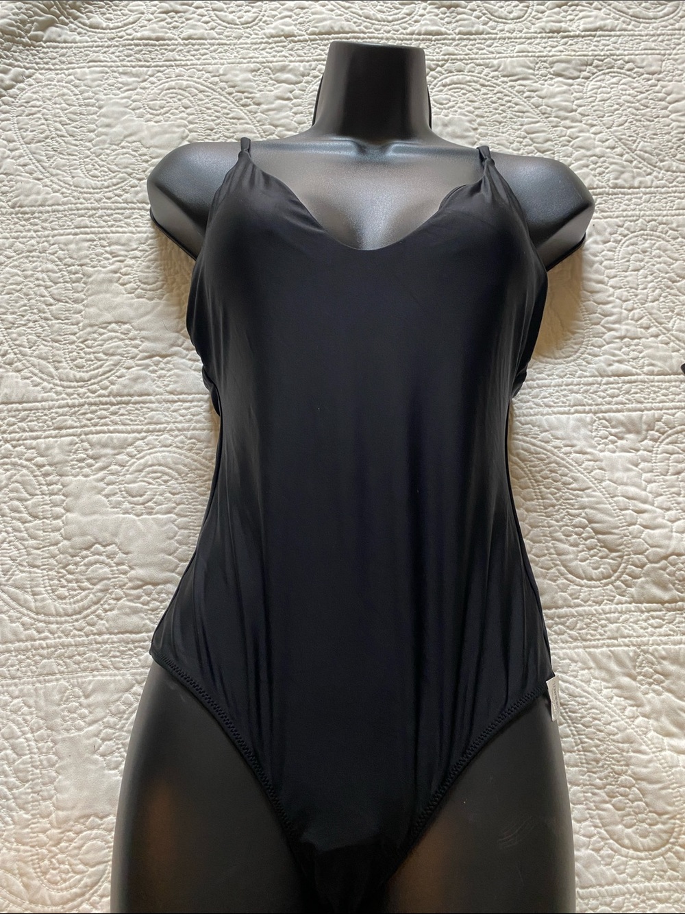 Aerie black one-piece swimsuit features a plunge neckline  adjustable straps. XS